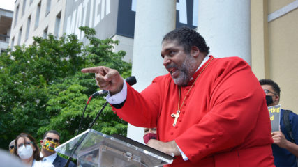 The Rev. William Barber, co-chair of the Poor People’s Campaign, addresses a crowd outside St. John’s Episcopal Church, Sunday, June 14, 2020, in Washington, D.C. RNS photo by Jack Jenkins