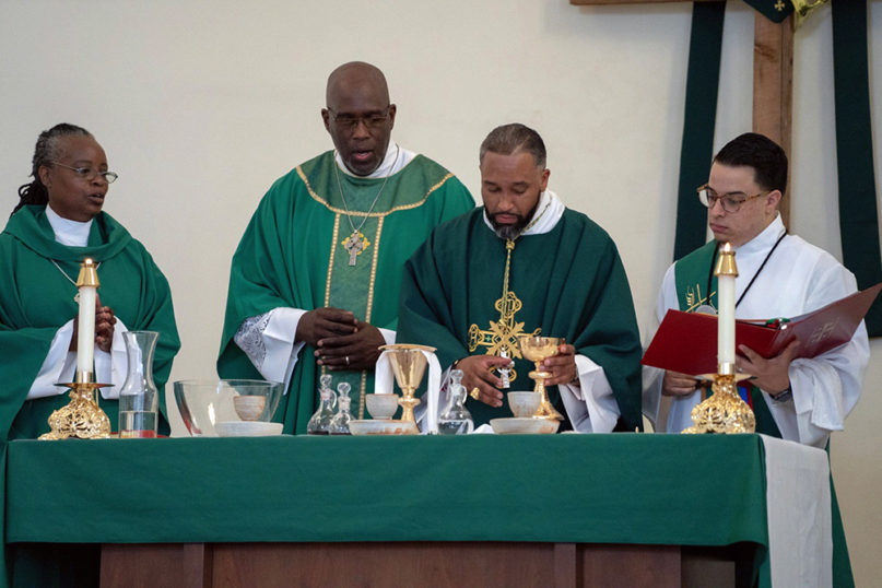 Bishop Emilio Alvarez, center right, celebrates the Eucharist at The Cathedral at the Gathering Place in Rochester, New York. Courtesy photo