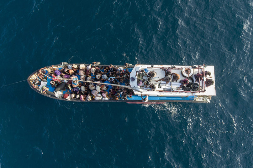 This drone photo shows a boat carrying ethnic Rohingya Muslims,  off Lhoksukon, North Aceh, Indonesia, Wednesday, June 24, 2020. Indonesian fishermen discovered over 90 hungry, weak Rohingya Muslims on this wooden boat adrift off Indonesia’s northernmost province of Aceh. Police say they were found on the rickety boat about 4 miles off the coast. They cried out for help and jumped onto the fishermen’s boat, but its engine also stopped working on the way to shore. (AP Photo/Zik Maulana)