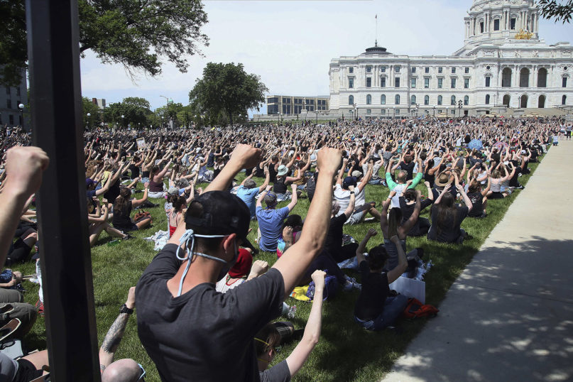 Thousands of people gather at the state Capitol in St. Paul, Minnesota, on June 2, 2020, to protest the death of George Floyd. Floyd died after being restrained by Minneapolis police officers on May 25. (AP Photo/Jim Mone)