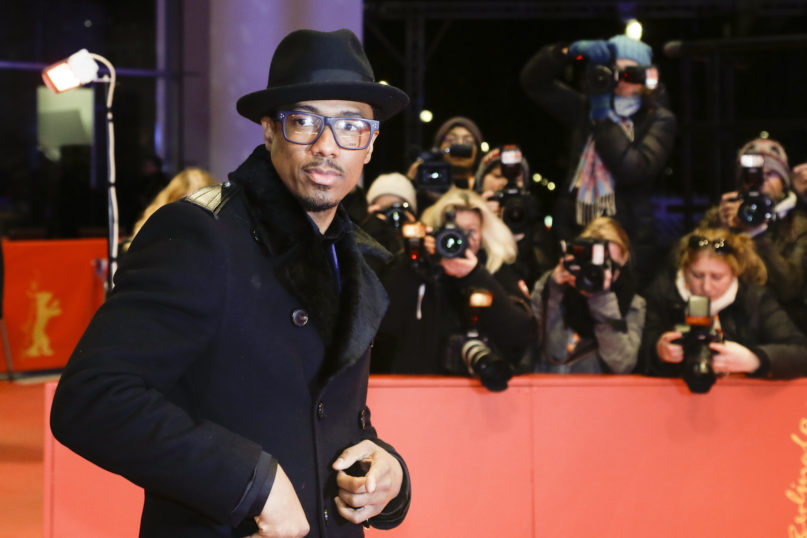 Actor Nick Cannon poses for the photographers on the red carpet for the film 'Chi-Raq' at the 2016 Berlinale Film Festival in Berlin on Feb. 16, 2016. (AP Photo/Markus Schreiber)