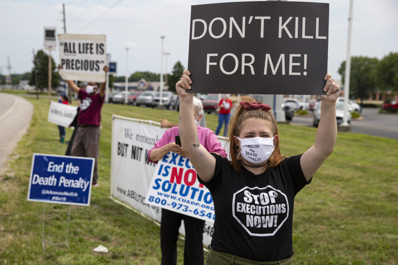 Protesters against the death penalty gather in Terre Haute, Indiana, on July 15, 2020. (AP Photo/Michael Conroy)