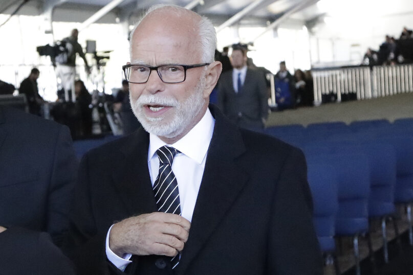 FILE - In this Friday, March 2, 2018 file photo, televangelist Jim Bakker leaves a funeral service for the Rev. Billy Graham in Charlotte, N.C. When the U.S. government extended pandemic hardship loans to thousands of religious institutions, Bakker and Morningside USA, his ministry in Blue Eye, Mo., were among the most high-profile recipients. (AP Photo/Chuck Burton)