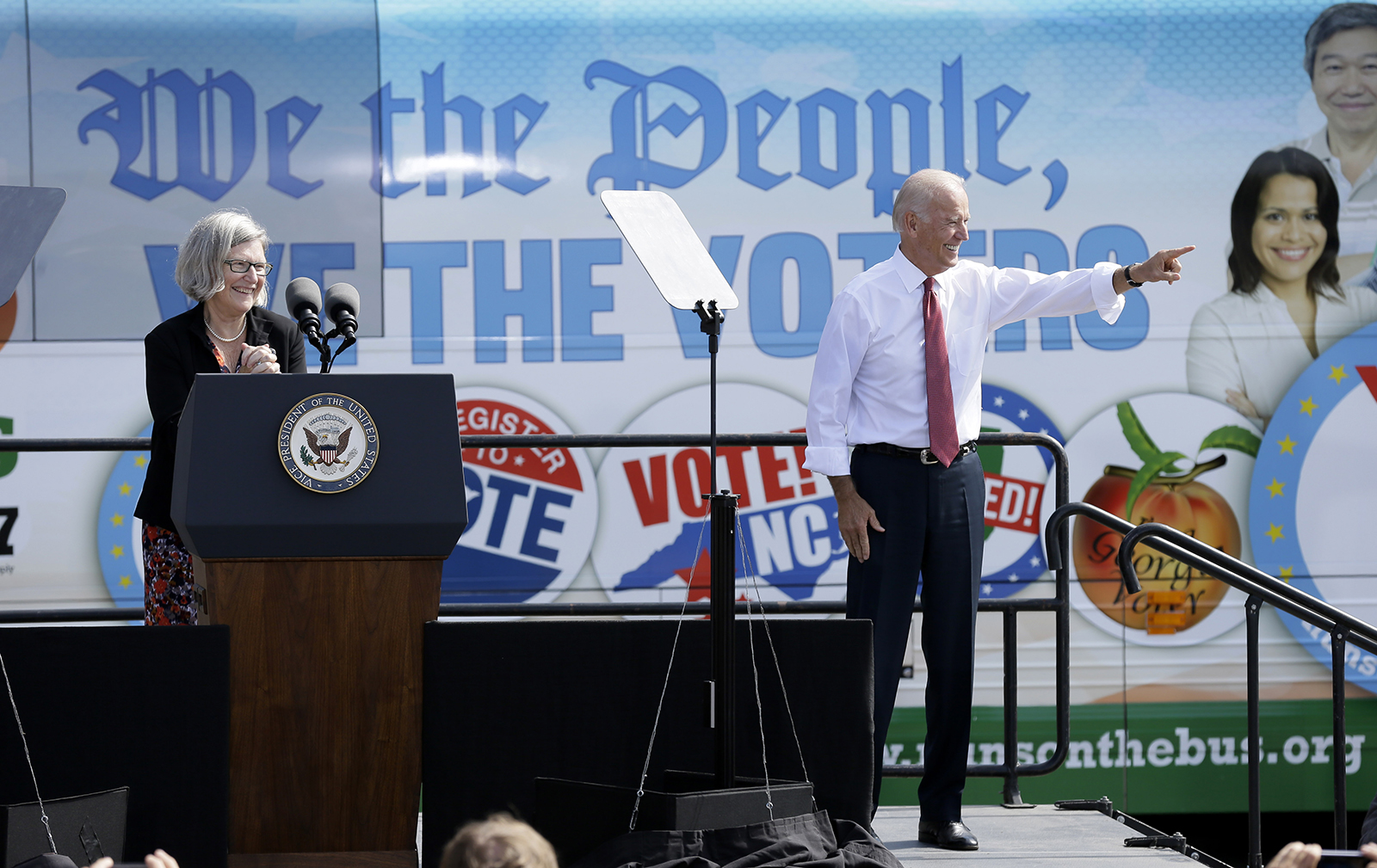 Vice President Joe Biden greets supporters with Sister Simone Campbell, left, during the kickoff of the Nuns on the Bus tour, Wednesday, Sept. 17, 2014, at the Statehouse in Des Moines, Iowa. (AP Photo/Charlie Neibergall)