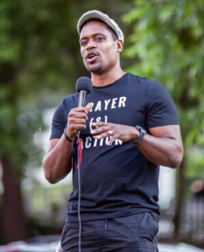 Justin Giboney speaks during a racial justice demonstration in Atlanta. Photo courtesy of the Prayer & Action Justice Initiative