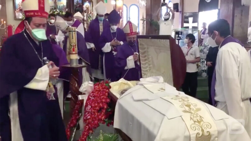 Clergy attend the funeral of the Rev. Ricardo Antonio Cortez in El Salvador. Video screengrab