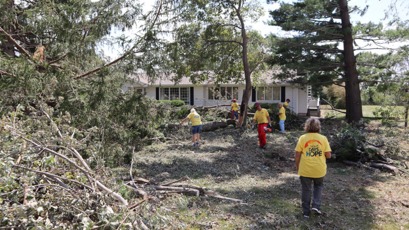 Volunteers with Eight Days of Hope work at a home damaged by recent storms in the Cedar Rapids area on Aug. 17, 2020. Courtesy photo