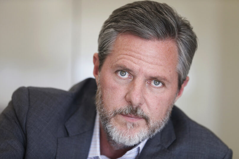 In this Nov. 16, 2016, photo, Liberty University President Jerry Falwell Jr. poses during an interview in his offices at the school in Lynchburg, Virginia. (AP Photo/Steve Helber)