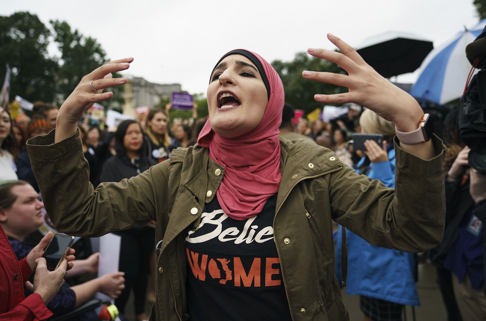 Linda Sarsour, with the Women’s March, calls out to other activists opposed to President Donald Trump’s embattled Supreme Court nominee, Brett Kavanaugh, in front of the Supreme Court on Capitol Hill in Washington, on Sept. 24, 2018. (AP Photo/Carolyn Kaster)