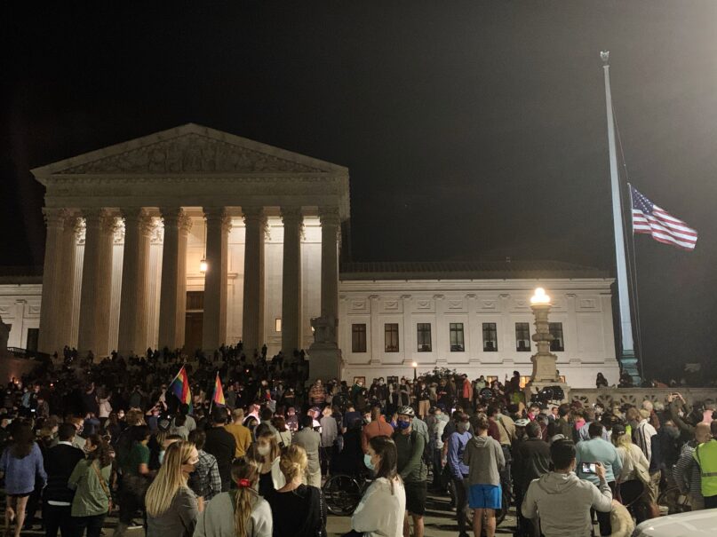 Thousands gather for an impromptu vigil outside the Supreme Court on Sept. 18, 2020, following the death of Justice Ruth Bader Ginsburg. RNS photo by Jack Jenkins