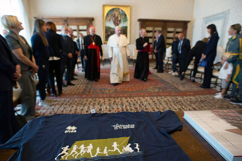 An Athletica Vaticana shirt on display as athletes have a private audience with Pope Francis. Photo courtesy of Athletica Vaticana