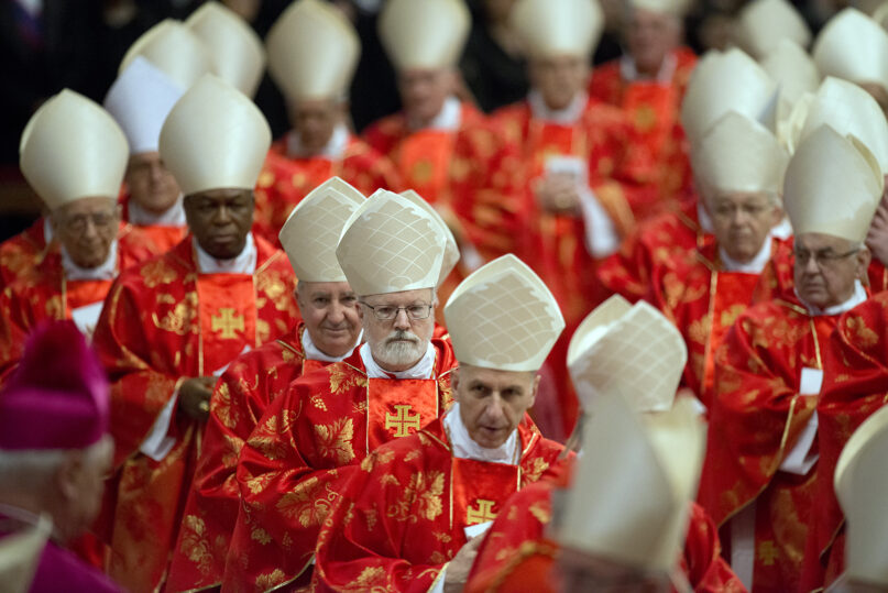 Cardinals leave the Pro Eligendo Pontiface Mass prior to the Conclave, March 12, 2013, at the Vatican. Photo by Jeffrey Bruno/Creative Commons