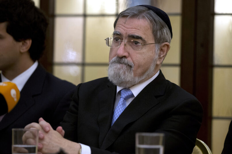 Rabbi Lord Jonathan Sacks holds a news conference at the Vatican on Nov. 17, 2014. (AP Photo/Andrew Medichini)
