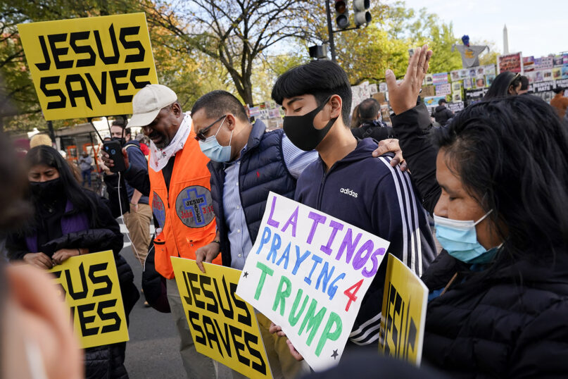 Demonstrators pray outside the White House on Nov. 3, 2020, in Washington. (AP Photo/Jacquelyn Martin)