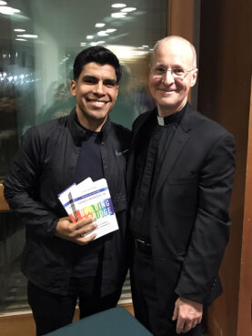 Eder Díaz Santillan, left, host of the Spanish-language podcast “De Pueblo, Católico & Gay,” with the Rev. James Martin, an advocate of the LGBTQ community. Courtesy photo