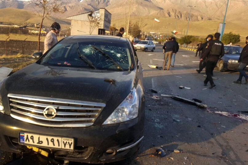 This photo released by the semiofficial Fars News Agency shows the scene where Mohsen Fakhrizadeh was killed in Absard, a small city just east of the capital, Tehran, Iran, on Nov. 27, 2020. Fakhrizadeh, an Iranian scientist who Israel alleged led the Islamic Republic’s military nuclear program until its disbanding in the early 2000s, was “assassinated,” state television said. (Fars News Agency via AP)