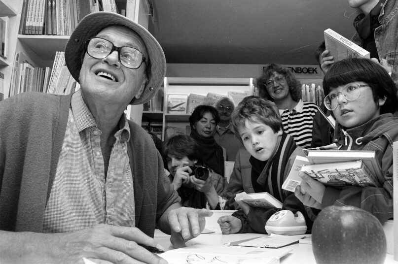 Roald Dahl, left, signs books in Amsterdam in October 1988. Photo by Rob Bogaerts/Anefo/Creative Commons