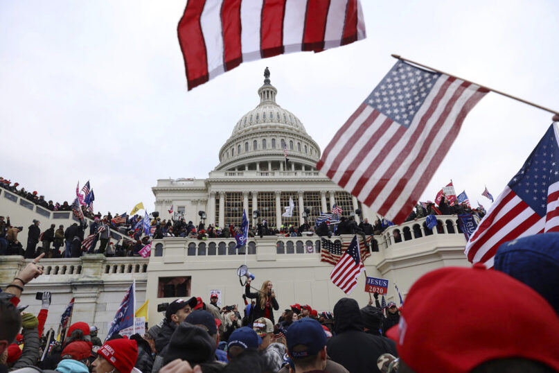 Supporters of President Donald Trump gather outside the U.S. Capitol on Jan. 6, 2021, in Washington. (AP Photo/Shafkat Anowar)
