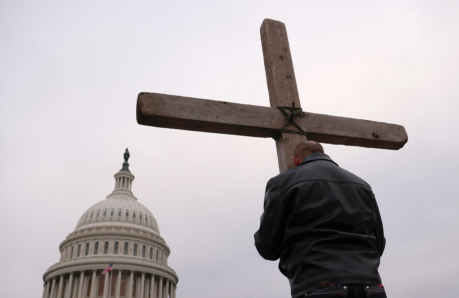 Politics Supporters of U.S. President Donald Trump put up a Cross outside the U.S. Capitol on Jan. 6, 2021. (Photo by Win McNamee/Getty Images)