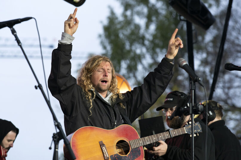 Christian musician Sean Feucht, of California, sings to the crowd during a 