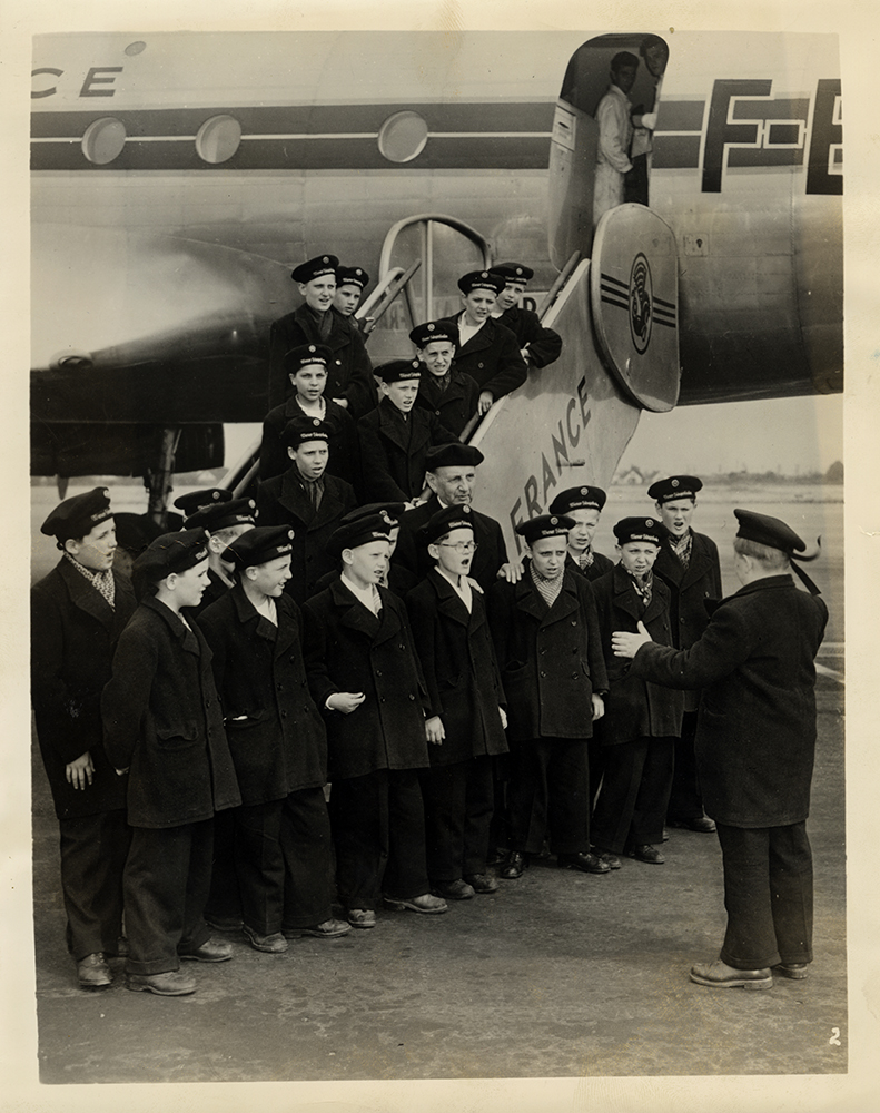 The Vienna Boys Choir performs on the tarmac in New York City after arriving there in 1948 on a 22 week concert tour of United States and Canada. RNS archive photo by Sol Hurok. Photo courtesy of the Presbyterian Historical Society