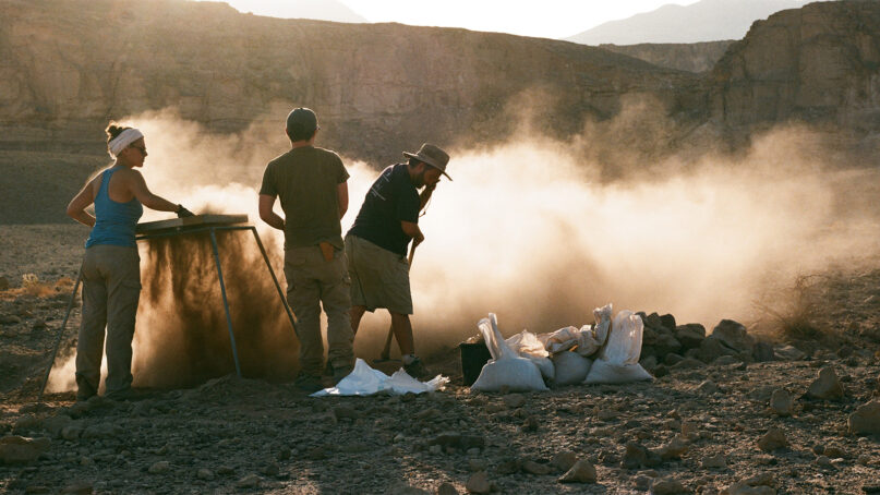 Workers excavate at Slaves’ Hill in the Timna Valley of southern Israel. (Photo by Hai Ashkenazi, courtesy of the Central Timna Valley Project)