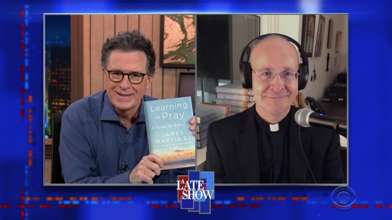 Stephen Colbert, left, interviews the Rev. James Martin, Feb. 3, 2021, on “A Late Show with Stephen Colbert” on CBS. Video screengrab via CBS
