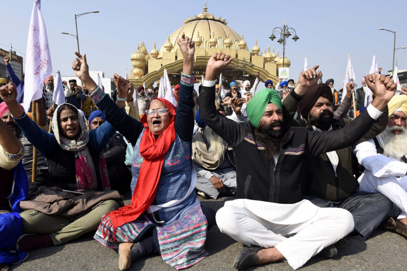 Indian farmers hold a protest on the outskirts of Amritsar in the northern state of Punjab, Feb. 6, 2021. (Photo by Narinder Nanu/AFP via Getty Images)