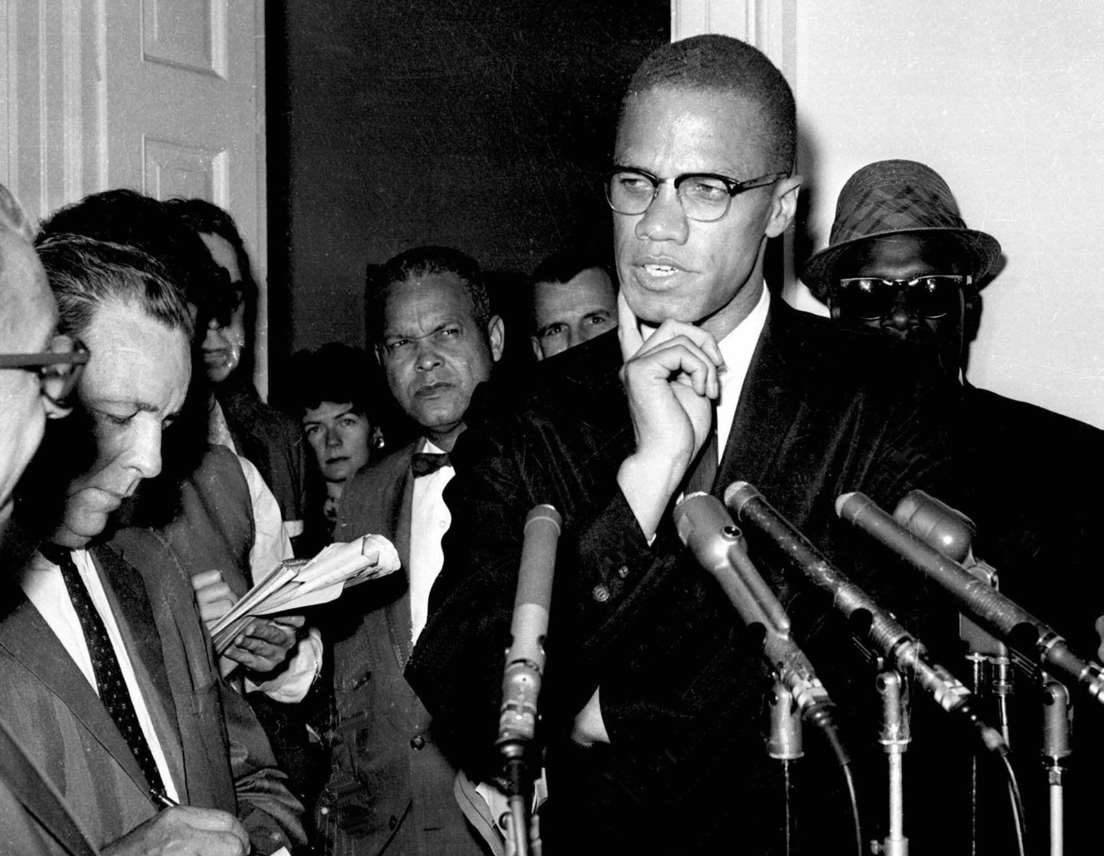 In this May 16, 1963, file photo, civil rights leader Malcolm X speaks to reporters in Washington, D.C. (AP Photo/file)