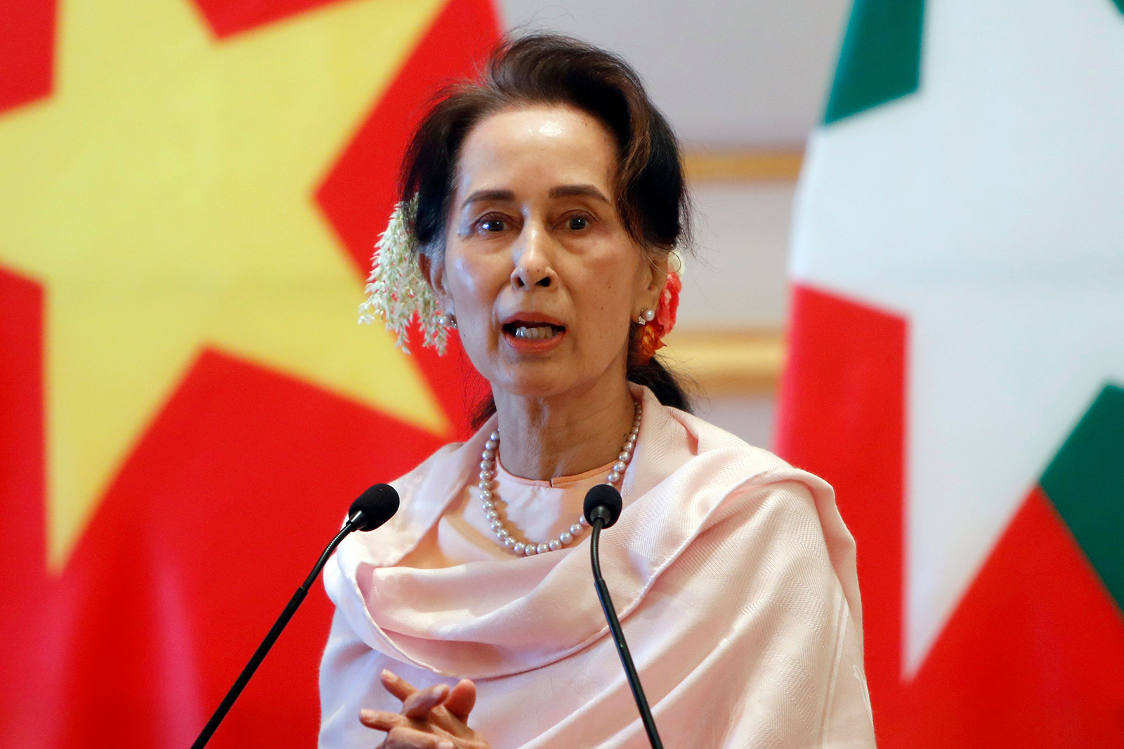 FILE - In this Dec. 17, 2019, file photo, Myanmar's leader Aung San Suu Kyi speaks during a joint press conference with Vietnam's Prime Minister Nguyen Xuan Phuc after their meeting at the Presidential Palace in Naypyitaw, Myanmar. Reports says Monday, Feb. 1, 2021 a military coup has taken place in Myanmar and Suu Kyi has been detained under house arrest. (AP Photo/Aung Shine Oo, File)