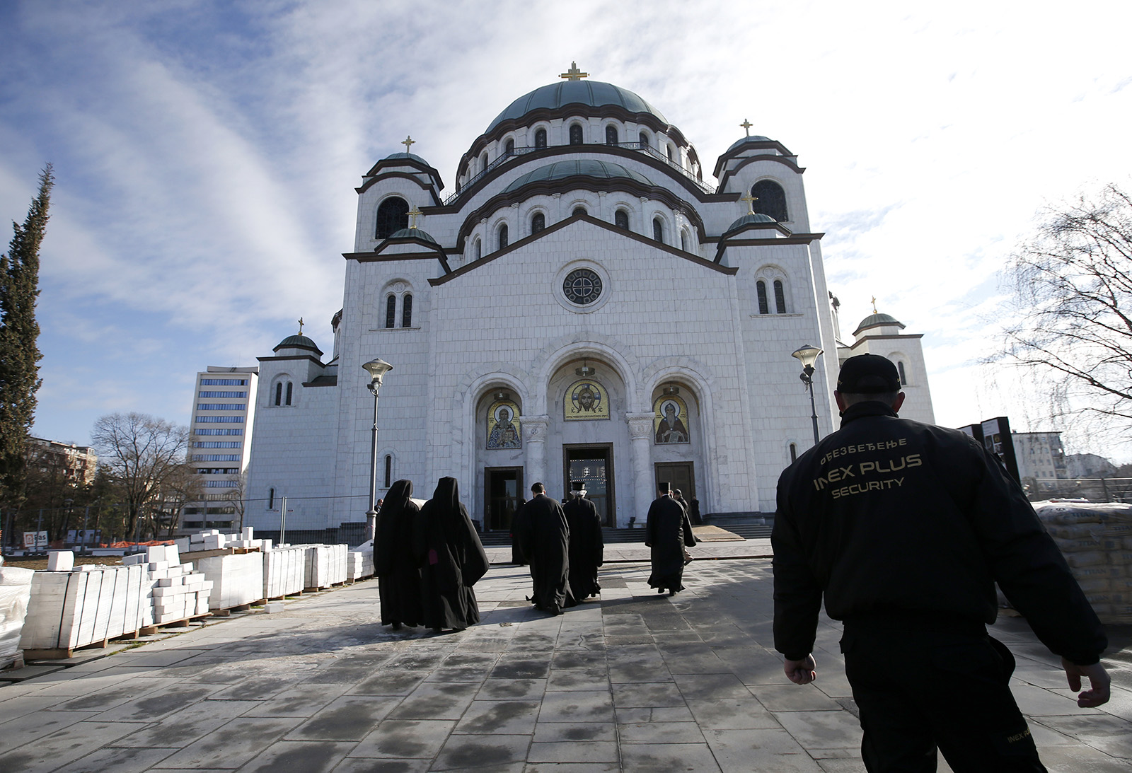 Serbian Orthodox Church bishops arrive at the St. Sava Temple before a closed session in Belgrade, Serbia, Thursday, Feb. 18, 2021. The Serbian Orthodox Church gathered in closed sessions to pick a new Patriarch, following the death of Irinej. Irinej died last year of COVID, following the outbreak of virus among church officials in Belgrade. (AP Photo/Darko Vojinovic)