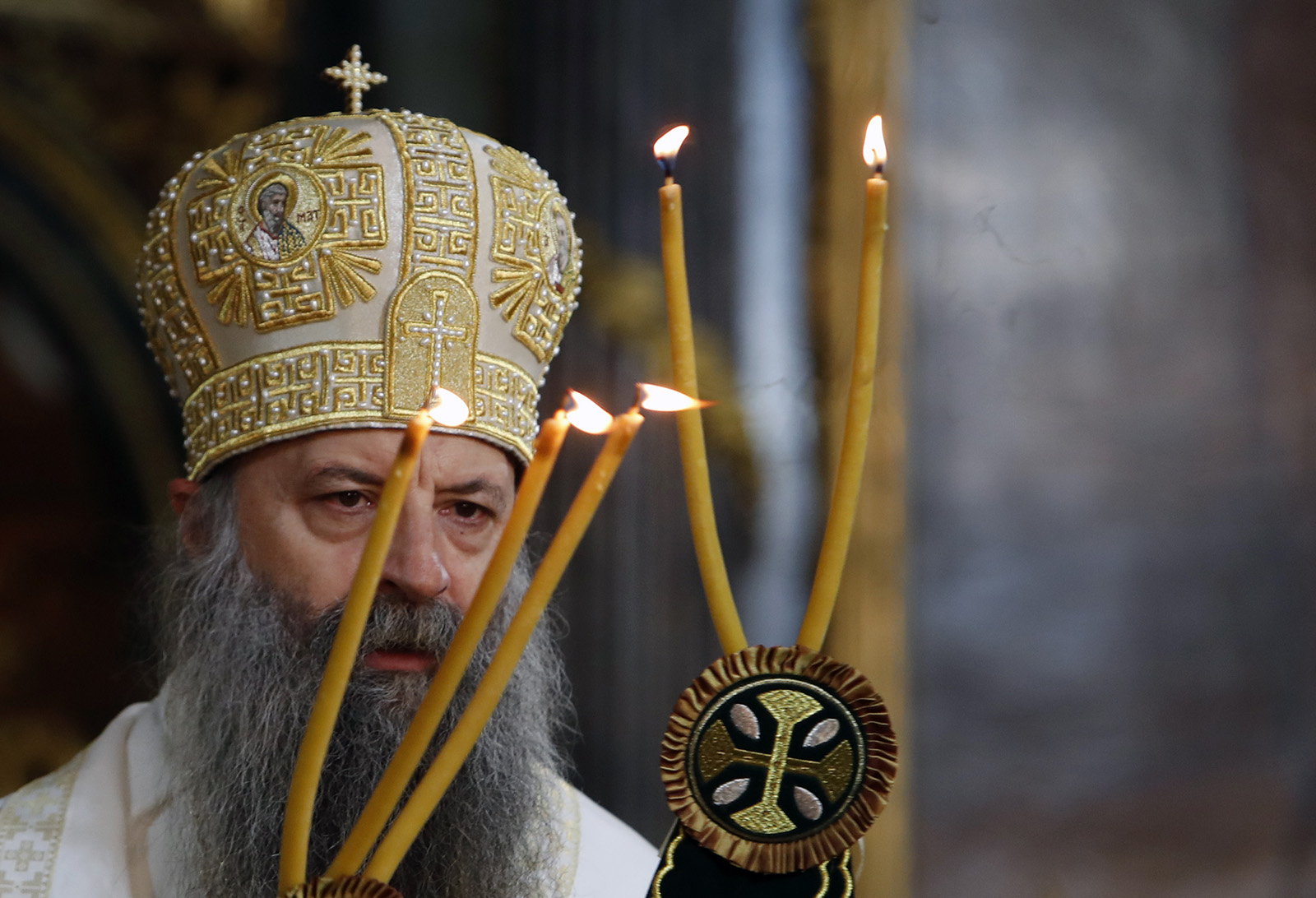 The new head of the Serbian Orthodox Church, Patriarch Porfirije, performs the liturgy ceremony in Congregational Church, in Belgrade, Serbia, Friday, Feb. 19, 2021. Patriarch Porfirije replaces Patriarch Irinej, who died in November 2020 from COVID-19 complications. (AP Photo/Darko Vojinovic)