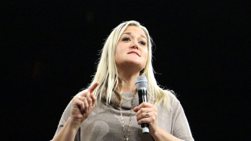 Bestselling author Shauna Niequist speaks on Oct. 21, 2016, at the Belong Tour stop at the Xcel Energy Center in St. Paul, Minn. RNS photo by Emily McFarlan Miller