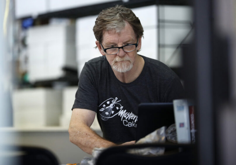 FILE - In this Monday, June 4, 2018, file photograph, baker Jack Phillips, owner of Masterpiece Cakeshop, manages his shop in Lakewood, Colo. Baker, who refused to make a wedding cake for a gay couple in 2012 is being sued by a lawyer for declining to make a cake celebrating her gender transition. The U.S. Supreme Court ruled in 2018 the commission showed anti-religious bias when it sanctioned Phillips. The justices did not rule on the larger issue of whether businesses can invoke religious objections to refuse service to gays or lesbians. (AP Photo/David Zalubowski, File)
