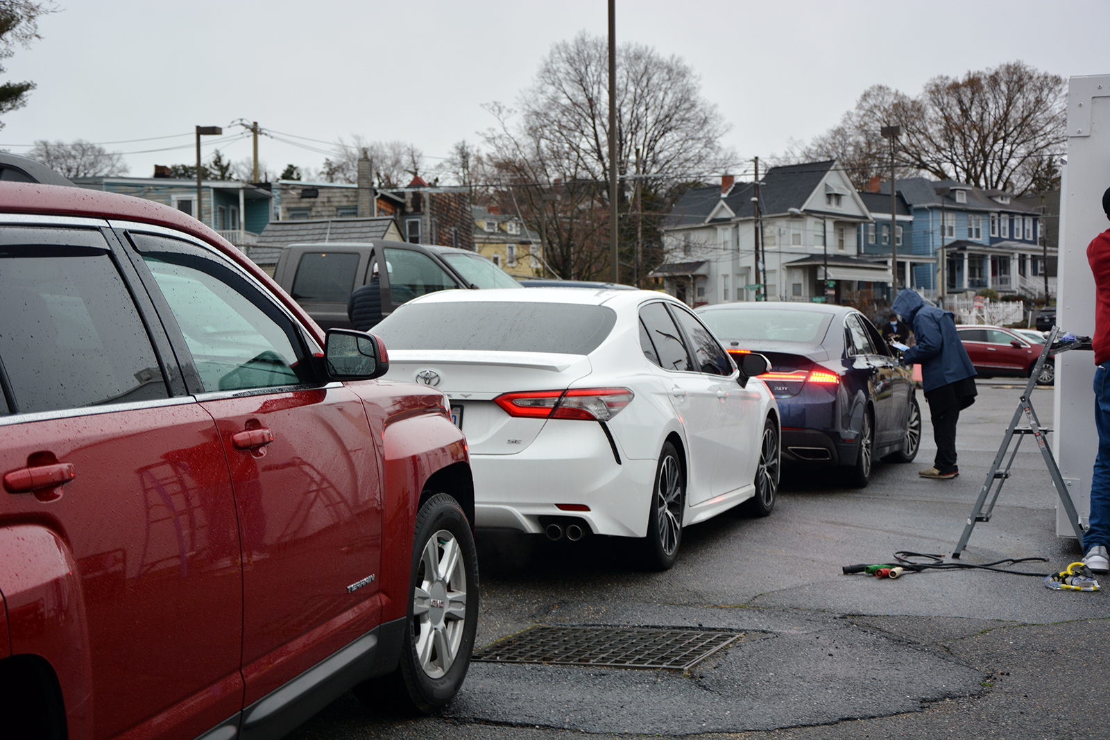 People wait in cars outside Union Temple Baptist Church before going in to receive the Moderna COVID-19 vaccine, Thursday, March 18, 2021, in Washington. RNS photo by Jack Jenkins