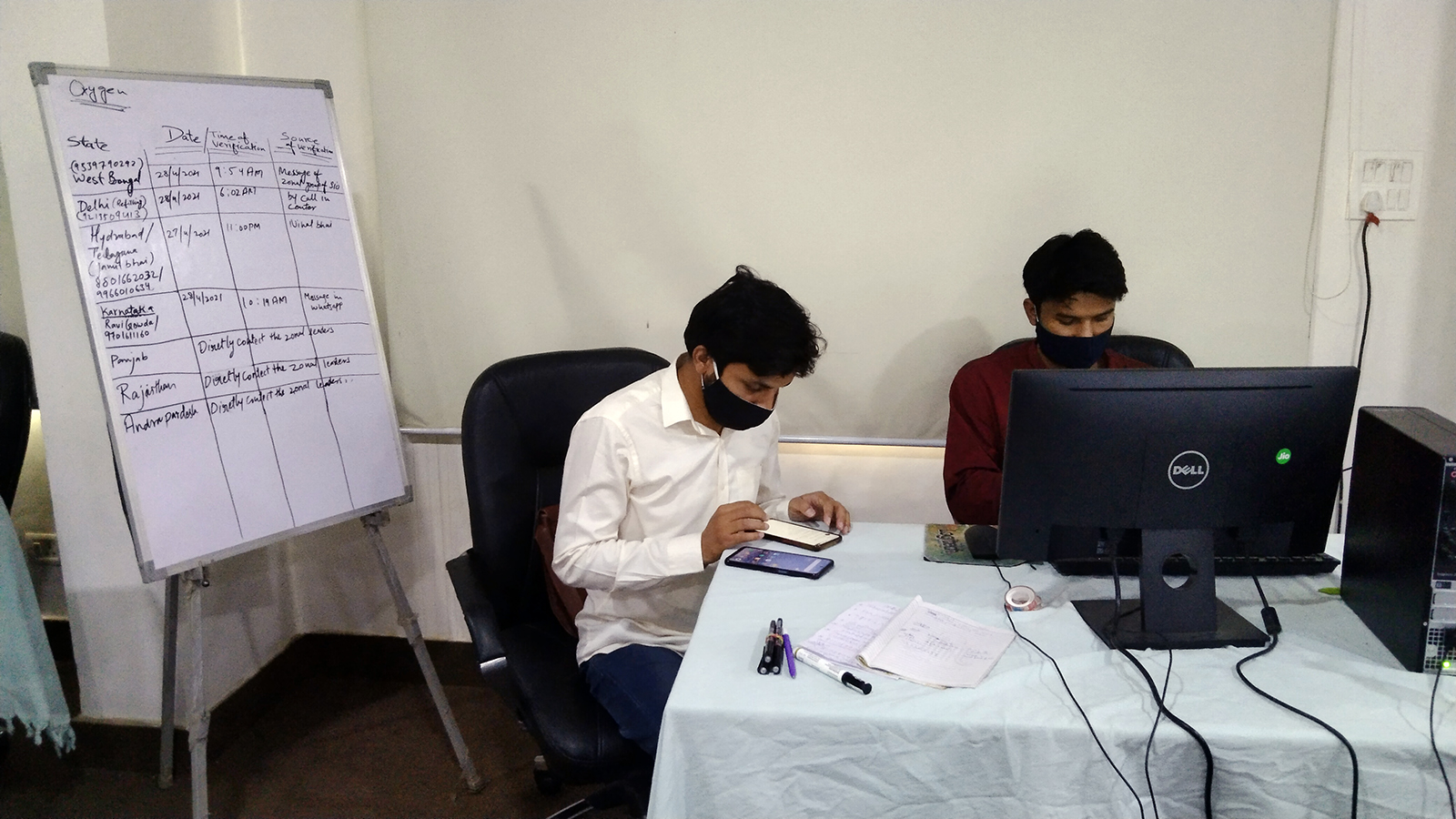 Volunteers with the Students Islamic Organization of India operate a 24-hour help line to connect patients across India with scarce resources, such as oxygen and plasma, in Dehli, India. Photo courtesy of Students Islamic Organization of India