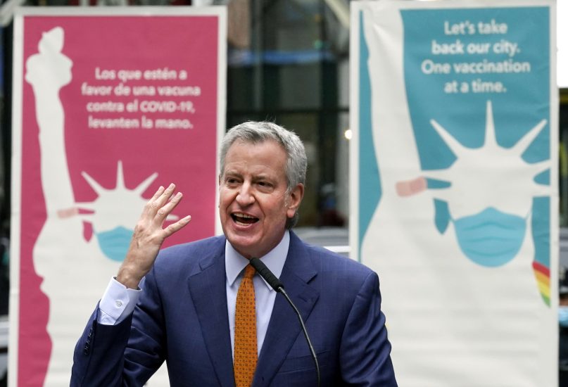 New York Mayor Bill de Blasio delivers his remarks in Times Square after he toured the grand opening of a Broadway COVID-19 vaccination site intended to jump-start the city's entertainment industry, in New York, Monday, April 12, 2021. (AP Photo/Richard Drew)