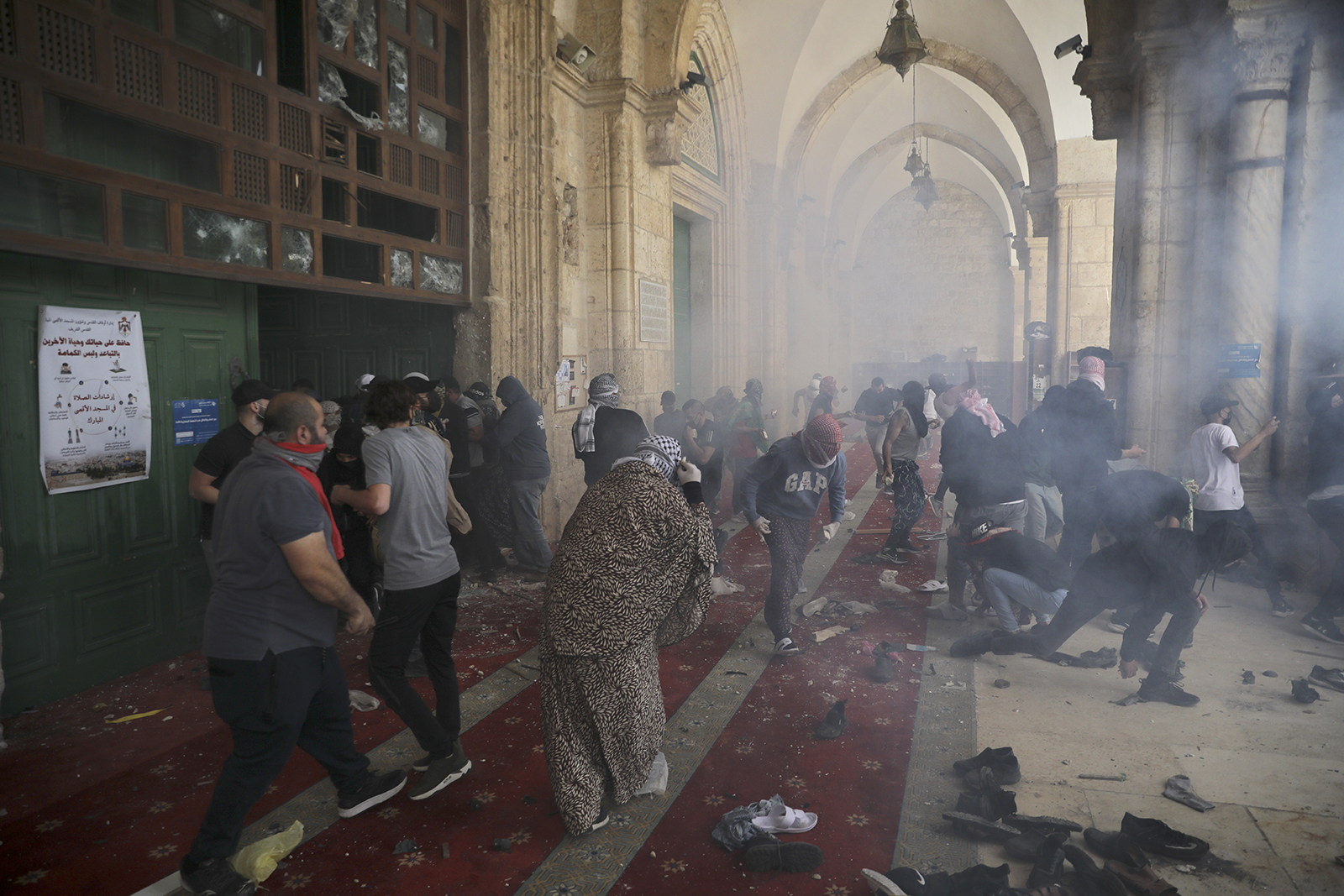 Palestinians clash with Israeli security forces on May 10, 2021, at the Al-Aqsa Mosque compound in Jerusalem's Old City. (AP Photo/Mahmoud Illean)