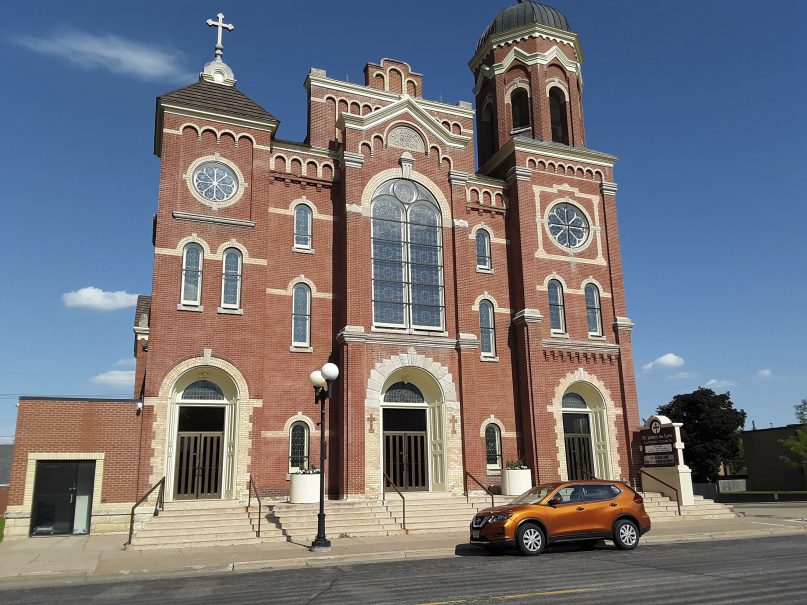 This June 2, 2021 photo shows St. James the Less parish in La Crosse, Wis. The Rev. James Altman who heads the parish, announced during a homily on May 23,  that Diocese of La Crosse Bishop Patrick Callahan had asked for his resignation. (Marilyn J. Richmond via AP)