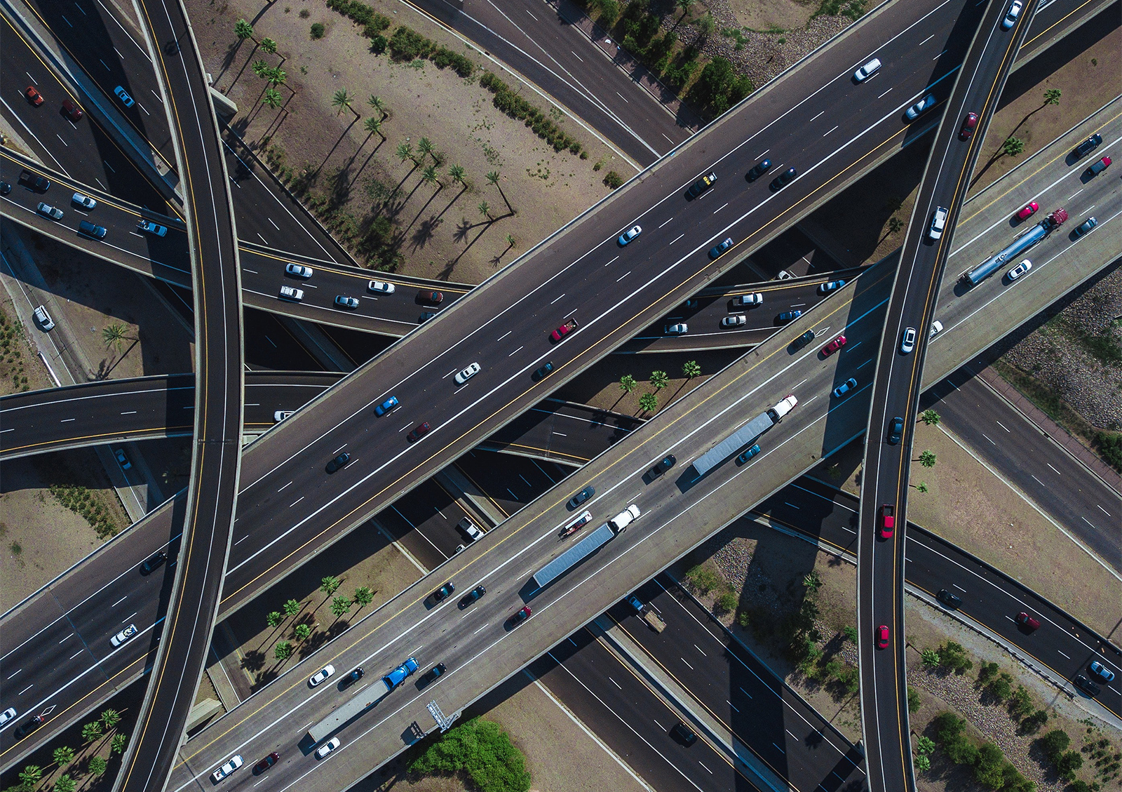 Vehicles travel along multiple layers of overpasses in Phoenix. Photo by Jared Murray/Unsplash/Creative Commons
