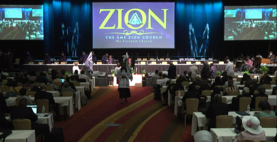 The AME Zion Church General Conference began with a celebration of the church’s paid debts during the meeting on July 28. The opening worship ended with a cermonial mortgage burning. Screengrab couretesy of AME Zion Church General Conference livestream