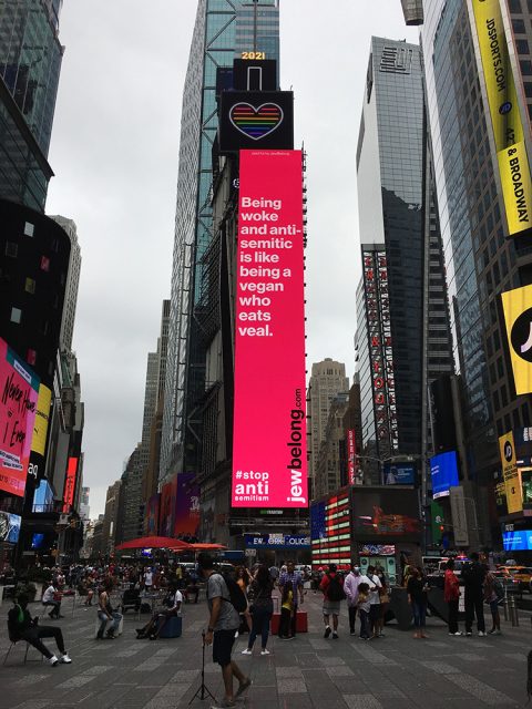 A large billboard in Times Square displays a message from JewBelong against antisemitism, July 12, 2021, in New York City. RNS photo by Renée Roden