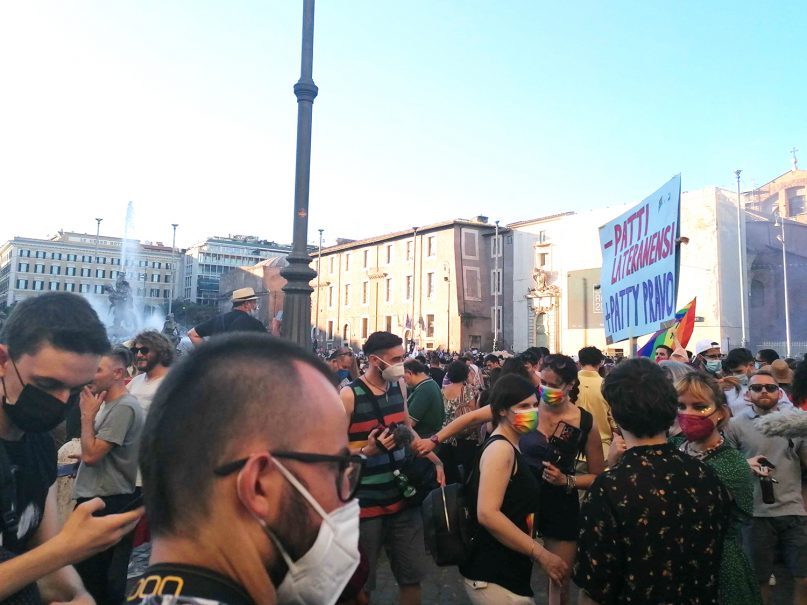 Crowds gather together for the pride parade in Rome last month. During the parade, some attendees mocked both the Vatican and the Pope for what they feel is undue interference in a Italian Senate bill. RNS photo by Claire Giangravè