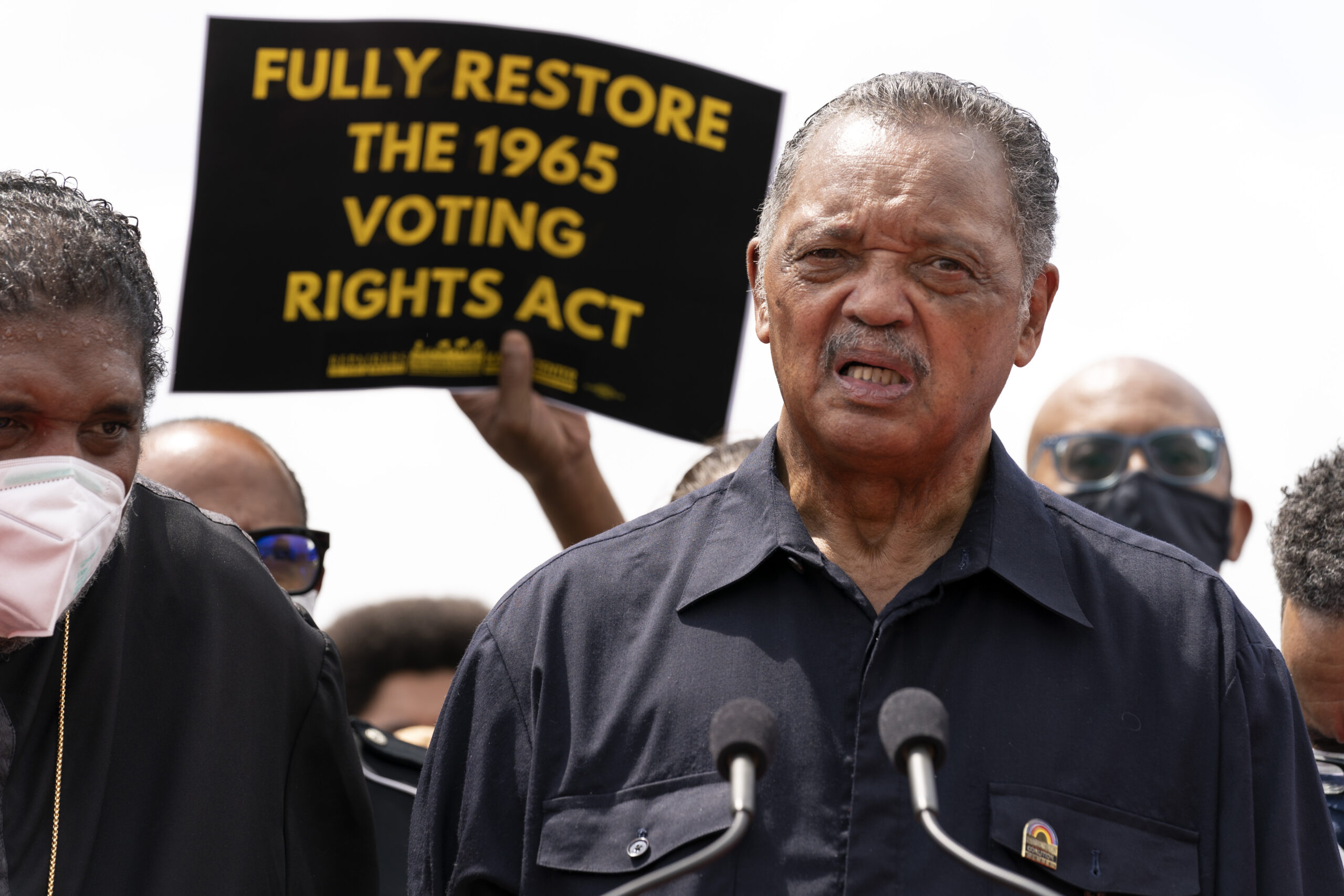 FILE - In this Monday, Aug. 2, 2021 file photo, Rev. Jesse Jackson speaks to the crowd during a demonstration supporting the voting rights, on Capitol Hill, in Washington. The Rev. Jesse Jackson and his wife, Jacqueline, have been hospitalized after testing positive for COVID-19 according to a statement Saturday, Aug. 21, 2021. He is vaccinated against the virus and publicly received his first dose in January. According to a statement released Saturday evening, the Jacksons are being treated at Northwestern Memorial Hospital in Chicago. He is 79 years old. Jacqueline Jackson is 77. (AP Photo/Jose Luis Magana, File)