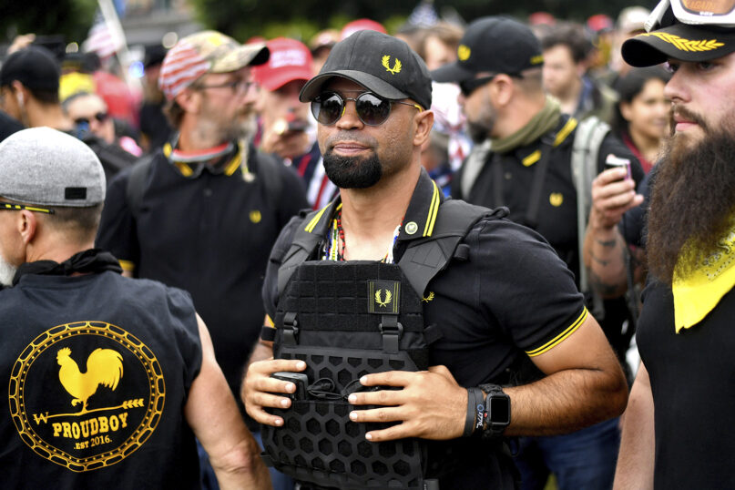 In this Aug. 17, 2019, file photo, Proud Boys chairman Enrique Tarrio rallies in Portland, Oregon. Outside pressures and internal strife are roiling two far-right extremist groups after members were charged in the attack on the U.S. Capitol. Former President Donald Trump’s lies about a stolen 2020 election united an array of right-wing supporters, conspiracy theorists and militants on Jan. 6. (AP Photo/Noah Berger, File)