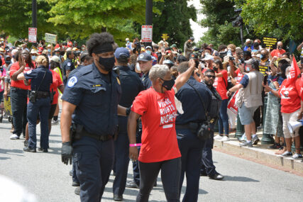 Activists are arrested during a Poor People's Campaign demonstration in Washington, Monday, Aug. 2, 2021. RNS photo by Jack Jenkins