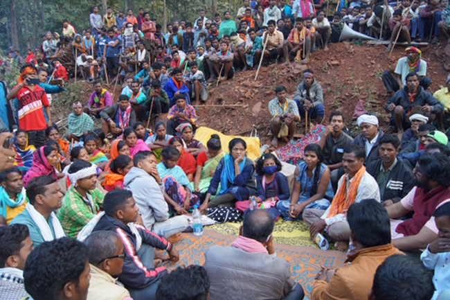 Activist Soni Sori, seated center, meets with indigenous people in Chhattisgarh, India. Photo by Lingaram Kodopi