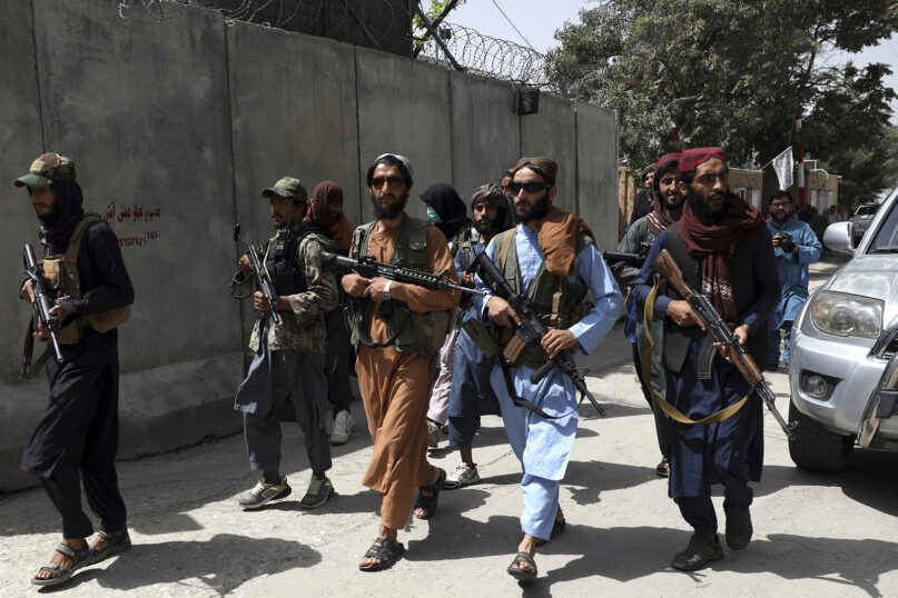 Taliban fighters patrol in the Wazir Akbar Khan neighborhood of Kabul, Afghanistan, on Aug. 18, 2021. The Taliban declared an “amnesty” across Afghanistan and urged women to join their government Tuesday, seeking to convince a wary population that they have changed a day after deadly chaos gripped the main airport as desperate crowds tried to flee the country. (AP Photo/Rahmat Gul)