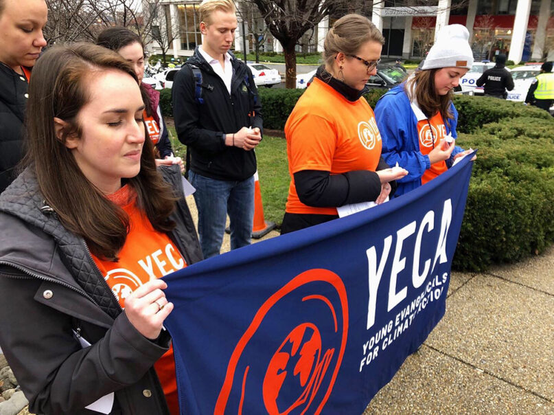 Members of Young Evangelicals for Climate Action bow their heads in prayer during an event. YECA is holding an event this weekend to urge action on climate change. Photo courtesy of YECA