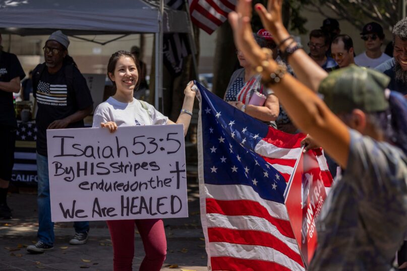 Many people are using Bible verses to justify their stance against vaccine. (David McNew/AFP via Getty Images)